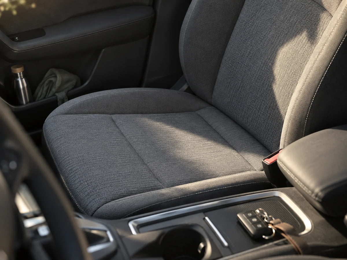 Illustrative clean grey fabric seat in morning daylight